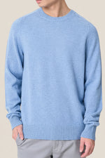 Rundhalset genser i ull med brodert flagglogo