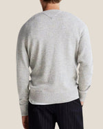Genser i ull med brodert flagglogo og rund hals